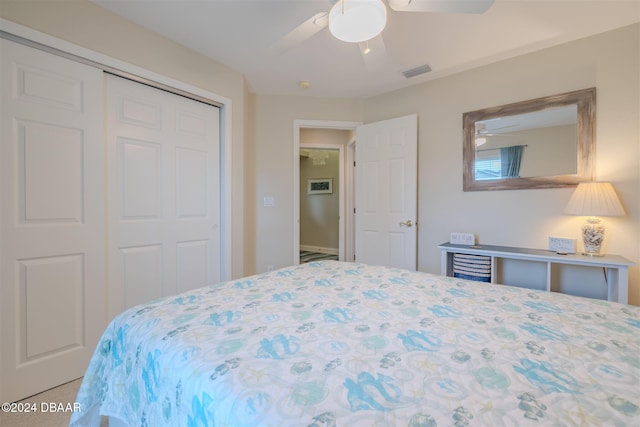 bedroom featuring a closet, carpet, and ceiling fan