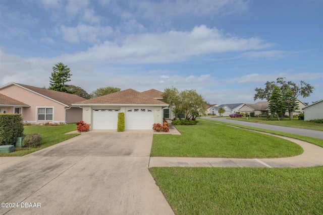 ranch-style house with a garage and a front yard