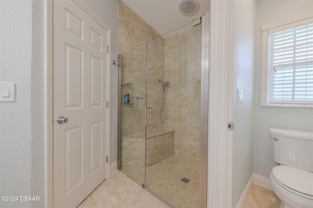 682 Middlebury Loop, New Smyrna Beach, FL 32168 - bathroom featuring a shower stall, toilet, and baseboards