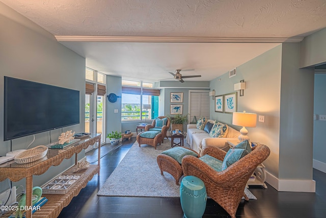 4565 S Atlantic Ave Unit 5501, Port Orange, FL 32127 - living room featuring a ceiling fan, wood finished floors, baseboards, and a textured ceiling