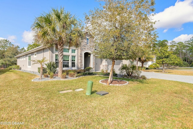 view of front of property with a front lawn