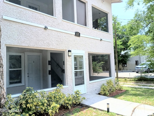 635 Tanglewood St, Daytona Beach, FL 32114 - property entrance with stucco siding