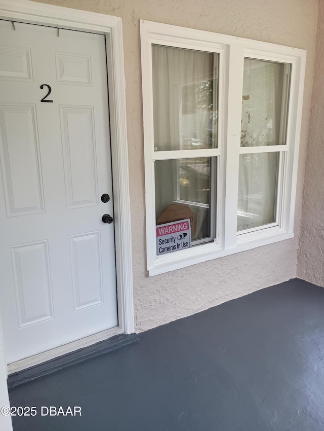 635 Tanglewood St, Daytona Beach, FL 32114 - entrance to property featuring stucco siding