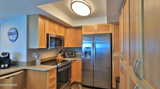 2625 S Atlantic Ave Unit 5Sw, Daytona Beach, FL 32118 - kitchen with stainless steel appliances and light countertops