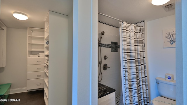 2625 S Atlantic Ave Unit 5Sw, Daytona Beach, FL 32118 - full bathroom with a tile shower and toilet