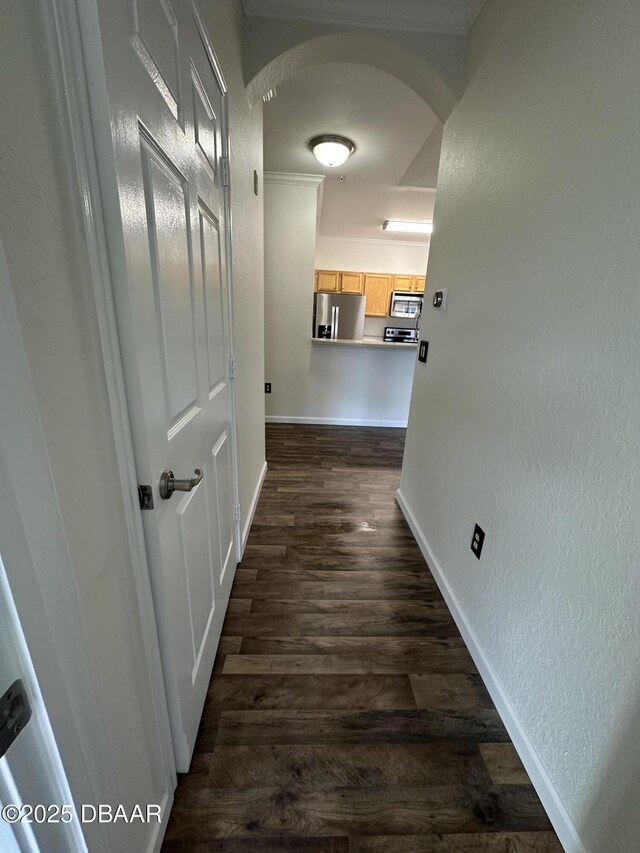 hall with dark hardwood / wood-style floors