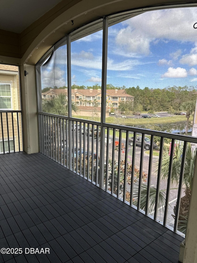 deck featuring a water view