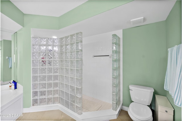 3315 S Atlantic Ave Unit 1605, Daytona Beach Shores, FL 32118 - bathroom with tile patterned flooring, toilet, and walk in shower