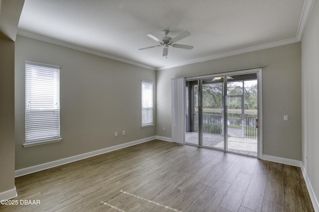 408 Chelsea Place Ave, Ormond Beach, FL 32174 - unfurnished room featuring crown molding, a ceiling fan, baseboards, and wood finished floors