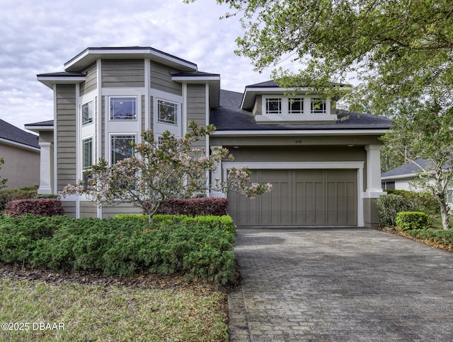 408 Chelsea Place Ave, Ormond Beach, FL 32174 - view of front of house with decorative driveway and roof with shingles