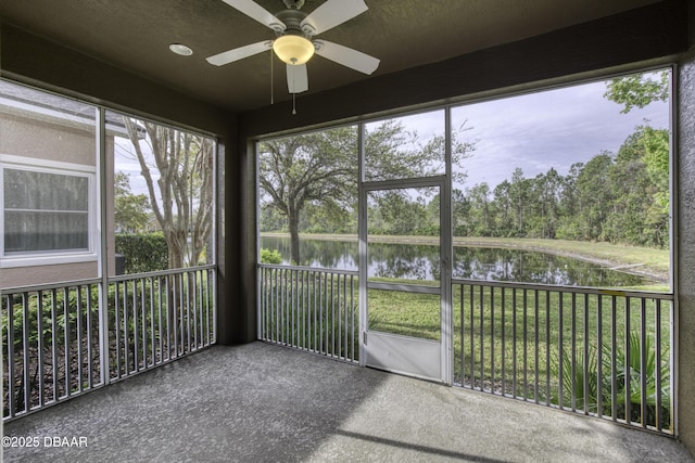 408 Chelsea Place Ave, Ormond Beach, FL 32174 - unfurnished sunroom featuring a healthy amount of sunlight, a water view, and ceiling fan