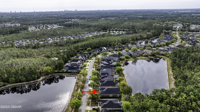 408 Chelsea Place Ave, Ormond Beach, FL 32174 - drone / aerial view with a residential view, a view of trees, and a water view