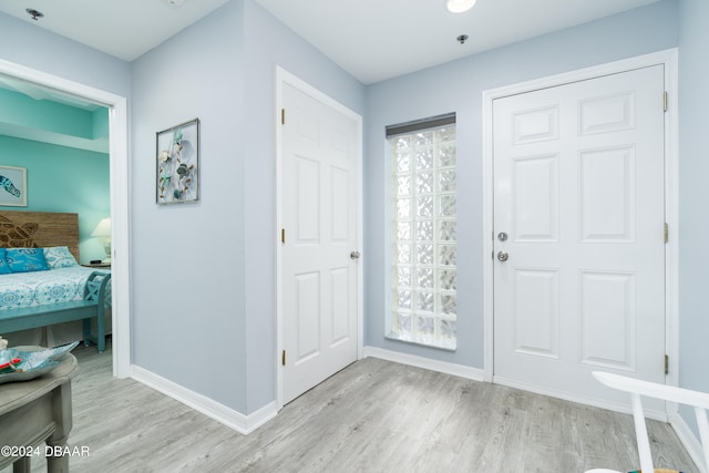 foyer entrance featuring light hardwood / wood-style flooring