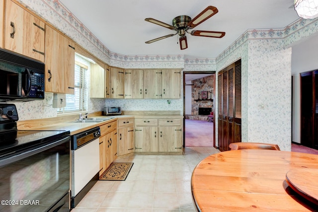 kitchen featuring sink, ceiling fan, black appliances, and light brown cabinets