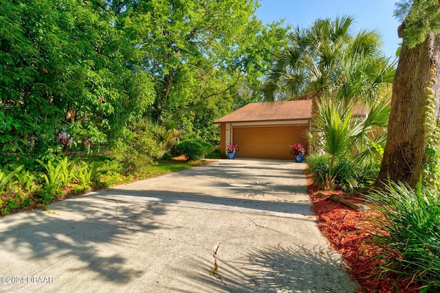 exterior space with a garage