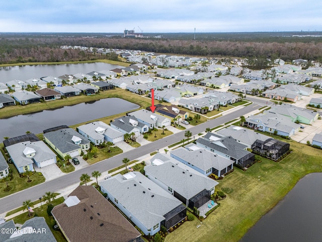 drone / aerial view featuring a water view