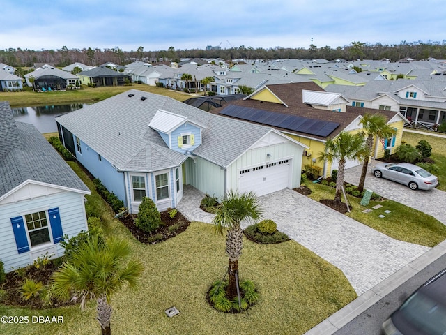 bird's eye view with a water view