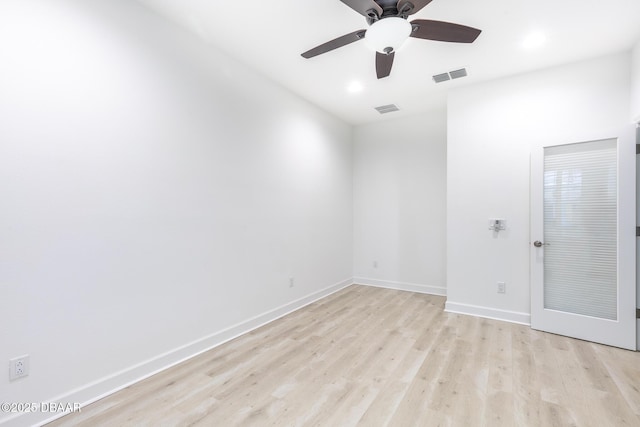 unfurnished room featuring light hardwood / wood-style flooring and ceiling fan