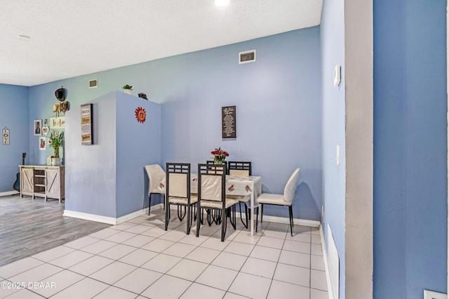3618 Dame St, Port Orange, FL 32129 - dining space with baseboards and light wood-type flooring