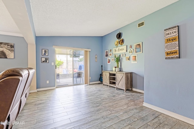 3618 Dame St, Port Orange, FL 32129 - office space featuring wood finished floors and a textured ceiling