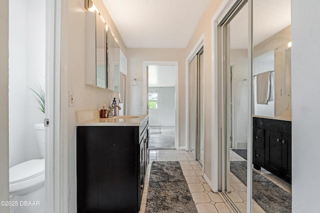 3618 Dame St, Port Orange, FL 32129 - full bathroom with vanity and a textured ceiling