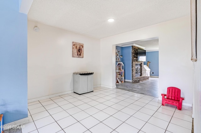 3618 Dame St, Port Orange, FL 32129 - unfurnished room featuring a textured ceiling, a smoke detector, recessed lighting, and tile patterned flooring