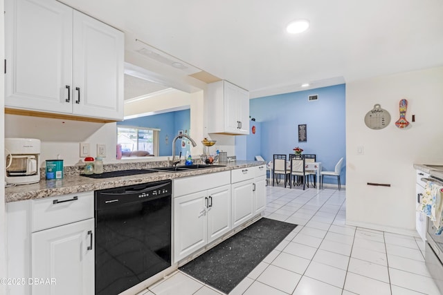 3618 Dame St, Port Orange, FL 32129 - kitchen featuring black dishwasher, white cabinets, light countertops, light tile patterned floors, and recessed lighting