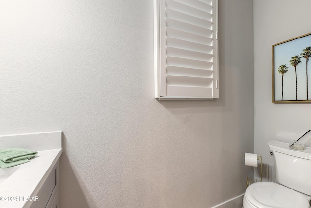 3066 Isles Way, New Smyrna Beach, FL 32168 - bathroom featuring vanity and toilet