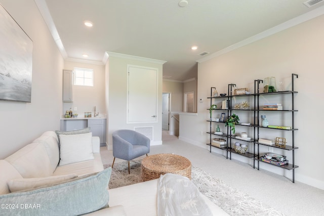 3066 Isles Way, New Smyrna Beach, FL 32168 - sitting room with light carpet, crown molding, and recessed lighting