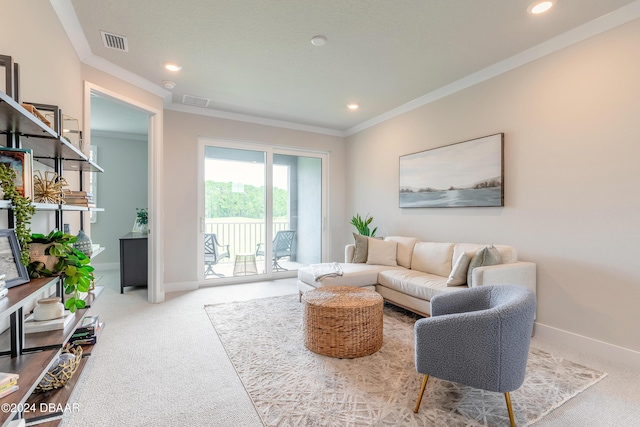 living room with crown molding and carpet floors