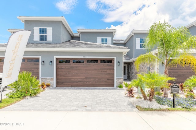 view of front of property featuring a garage