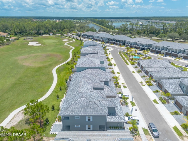 3066 Isles Way, New Smyrna Beach, FL 32168 - aerial perspective of suburban area featuring a nearby body of water and a golf club