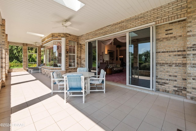 view of patio / terrace featuring ceiling fan