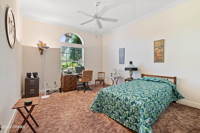 bedroom featuring ceiling fan, crown molding, and carpet floors