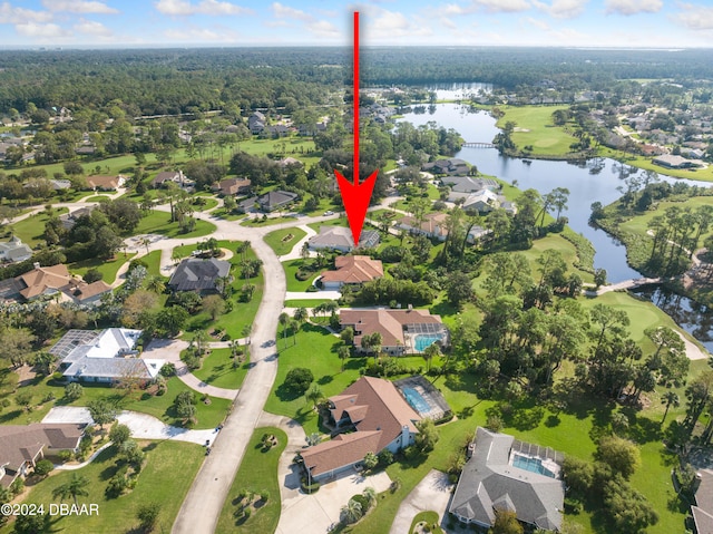 birds eye view of property featuring a water view