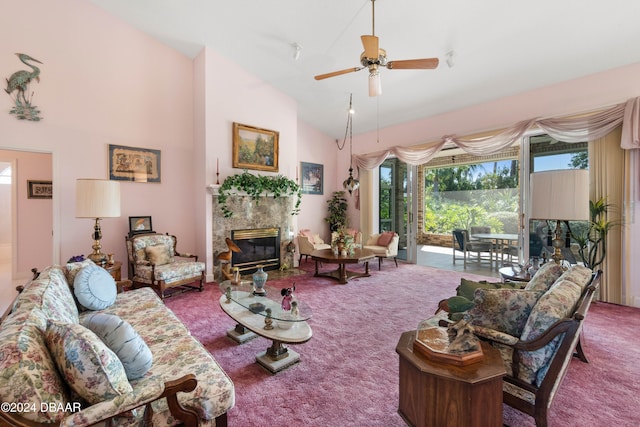 living room with carpet flooring, high vaulted ceiling, ceiling fan, and a high end fireplace