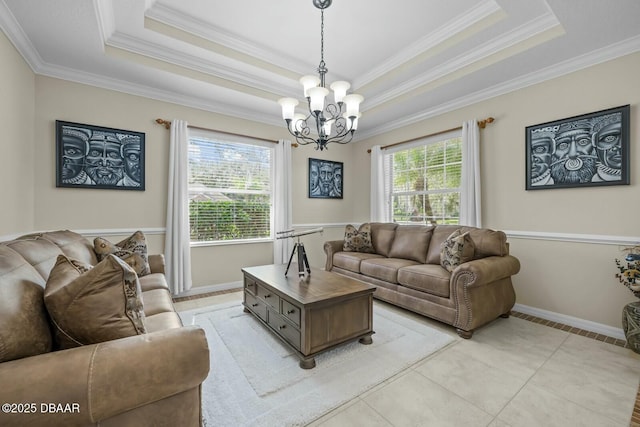 living room featuring light tile patterned floors, a tray ceiling, and a wealth of natural light