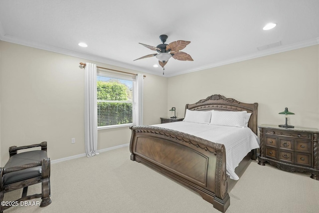 bedroom with baseboards, crown molding, and carpet flooring