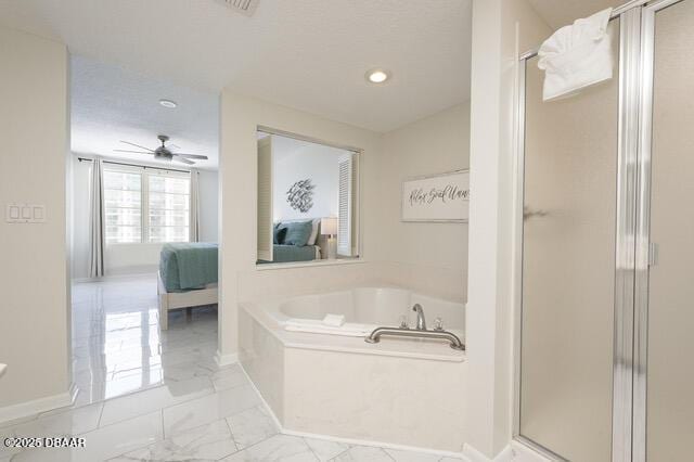 full bath with ensuite bathroom, marble finish floor, a stall shower, and a garden tub