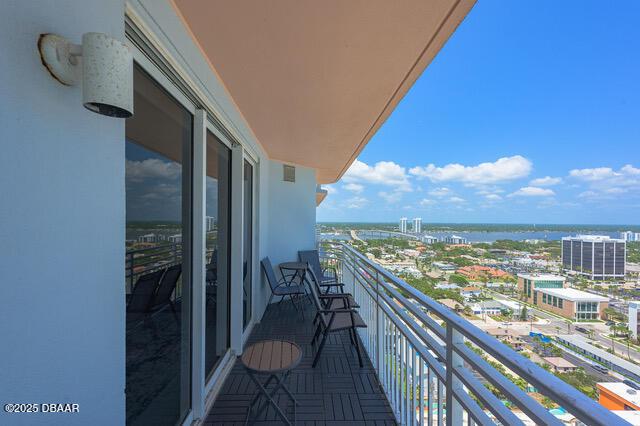 balcony with central AC and a city view