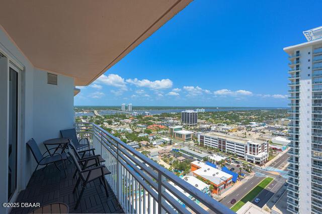 balcony featuring a city view