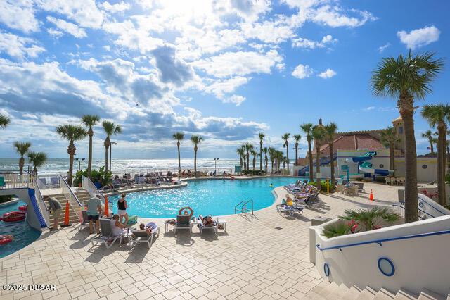 pool featuring a patio area