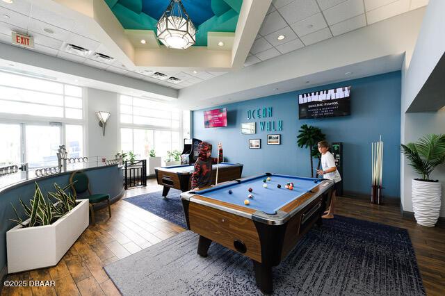 recreation room featuring a drop ceiling, billiards, visible vents, and wood finished floors