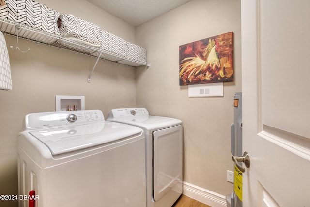 laundry area featuring independent washer and dryer