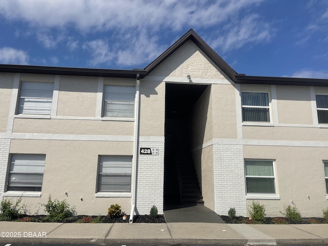 view of front of home featuring stucco siding
