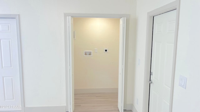 hallway featuring light wood-type flooring