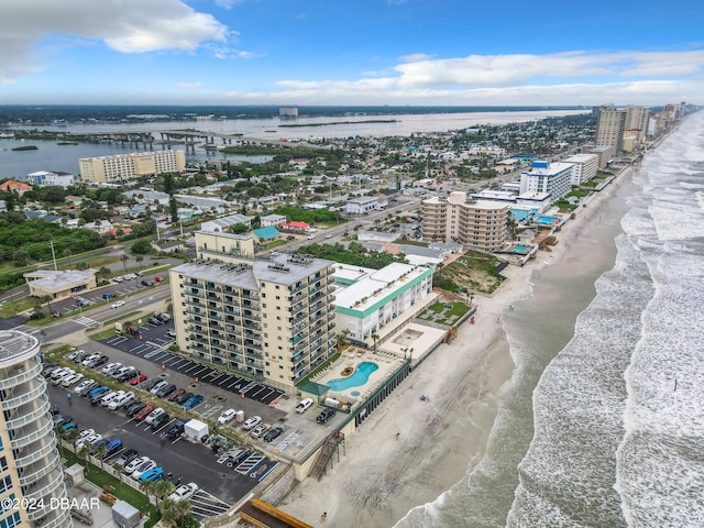 aerial view with a beach view and a water view