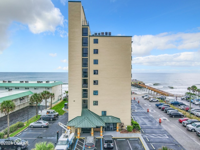 view of building exterior with a water view