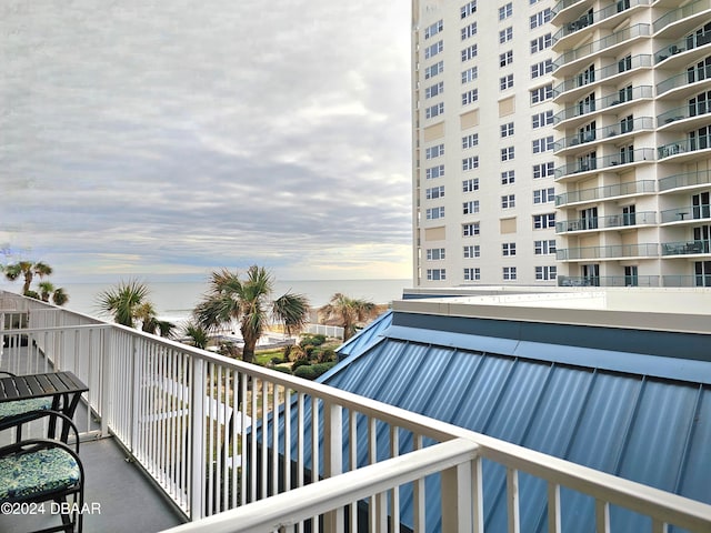 view of balcony at dusk