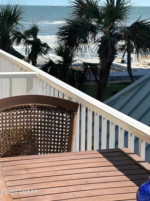 wooden deck with a water view